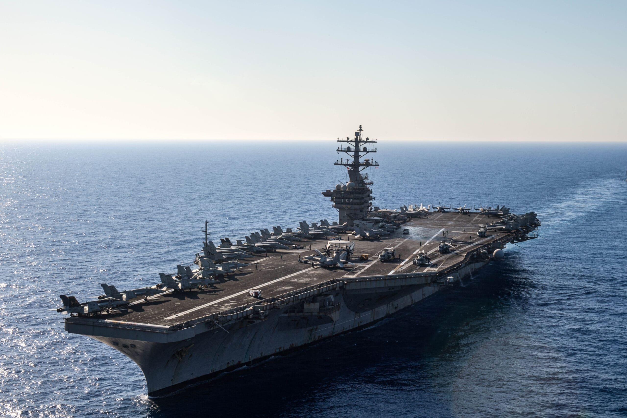 The USS Eisenhower aircraft carrier and the USS Wasp amphibious assault ...